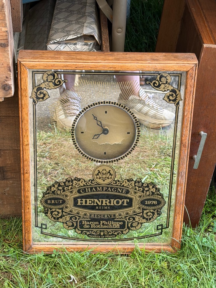 Champagne Henriot mirrored clock at Brimfield Flea Market